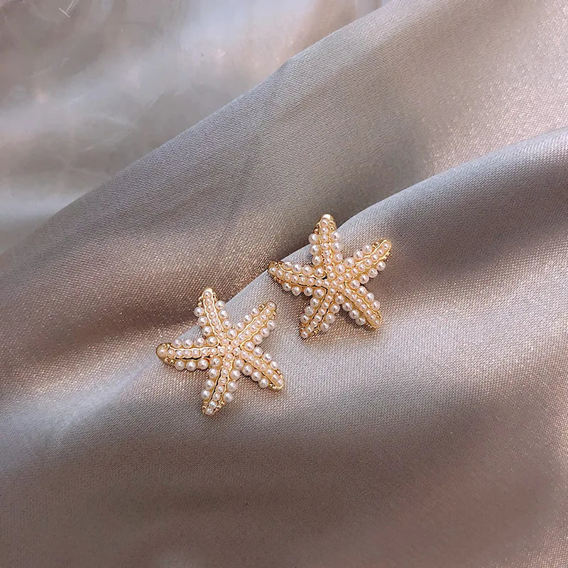Nuevo tipo de pendientes de estrella de mar para dormir, temperamento femenino, pendientes de diseño exquisito, regalos de fiesta, joyería de moda para mujer