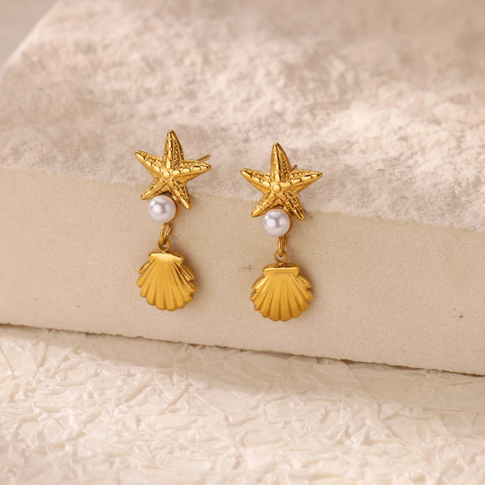 Exquisitos pendientes de estrella de mar de concha para mujer, pendientes de gota chapados en oro con perlas de imitación, joyería de acero inoxidable para fiesta 2025