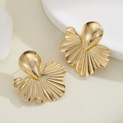 KMVEXO-pendientes de tuerca geométricos Vintage para fiesta Punk para mujer, aretes de hojas de albaricoque, accesorios de joyería para oreja a la moda, Gif 2024