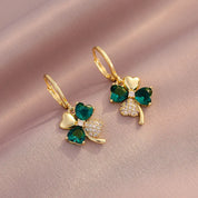 Pendientes colgantes de trébol ligeros de lujo para mujer, aretes elegantes de Metal de cristal de circón brillante, joyería fina de moda 2024
