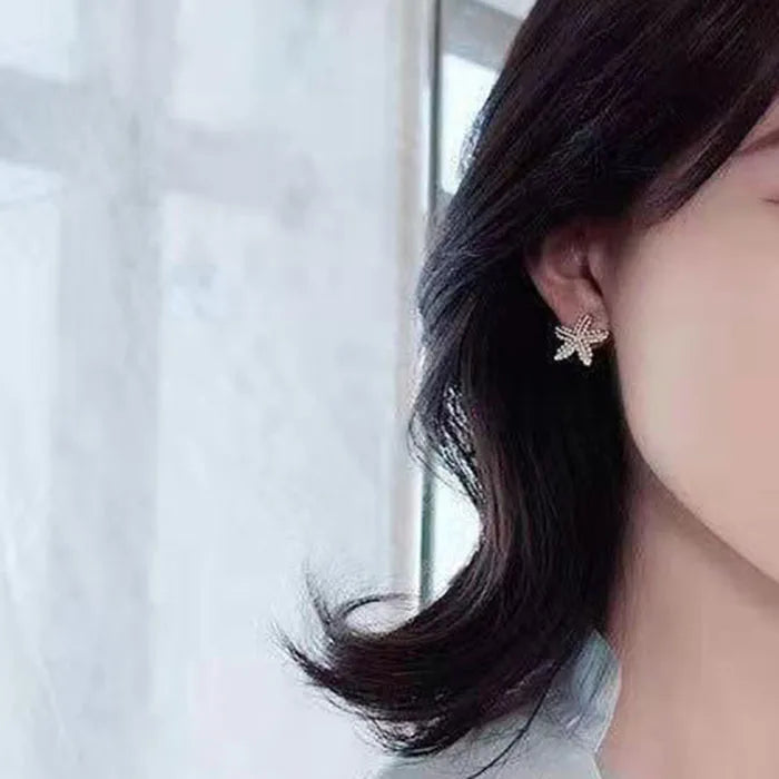 Nuevo tipo de pendientes de estrella de mar para dormir, temperamento femenino, pendientes de diseño exquisito, regalos de fiesta, joyería de moda para mujer