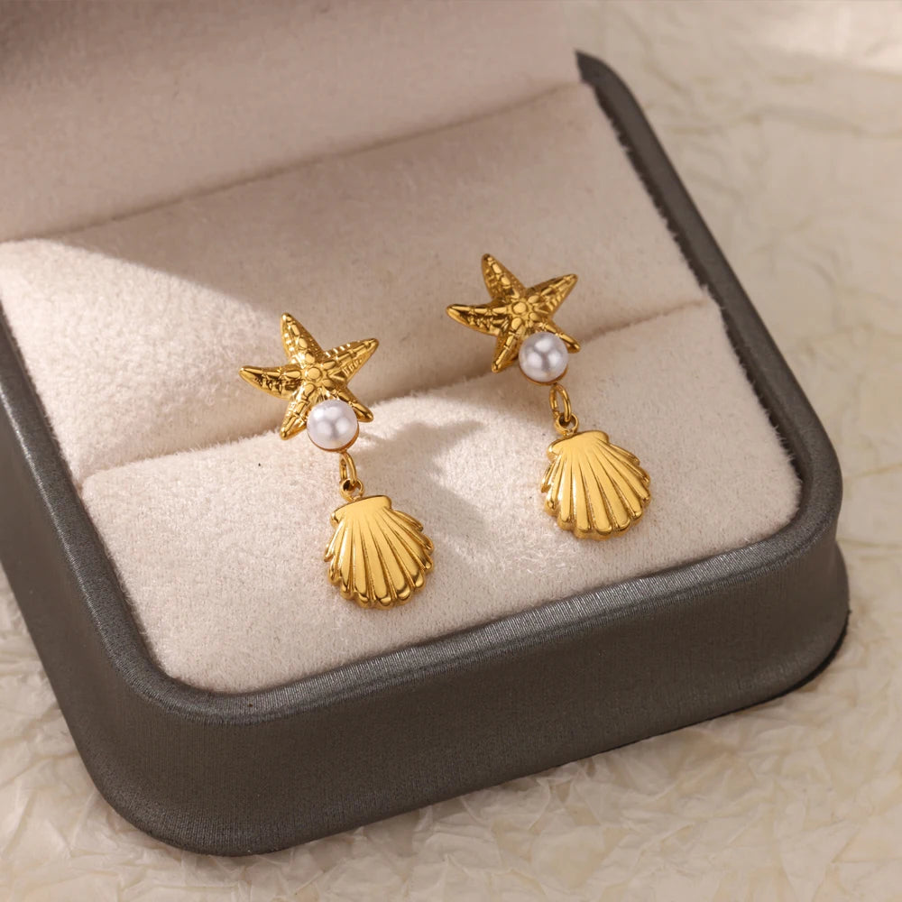 Exquisitos pendientes de estrella de mar de concha para mujer, pendientes de gota chapados en oro con perlas de imitación, joyería de acero inoxidable para fiesta 2025