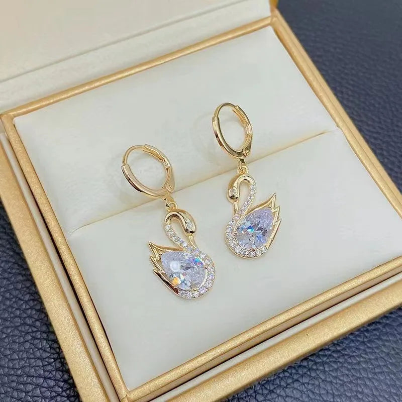 1 par de lujosos y elegantes pendientes Golden Swan, deslumbrantes, de cristal sintético, aptos para uso diario, fiestas y regalos.
