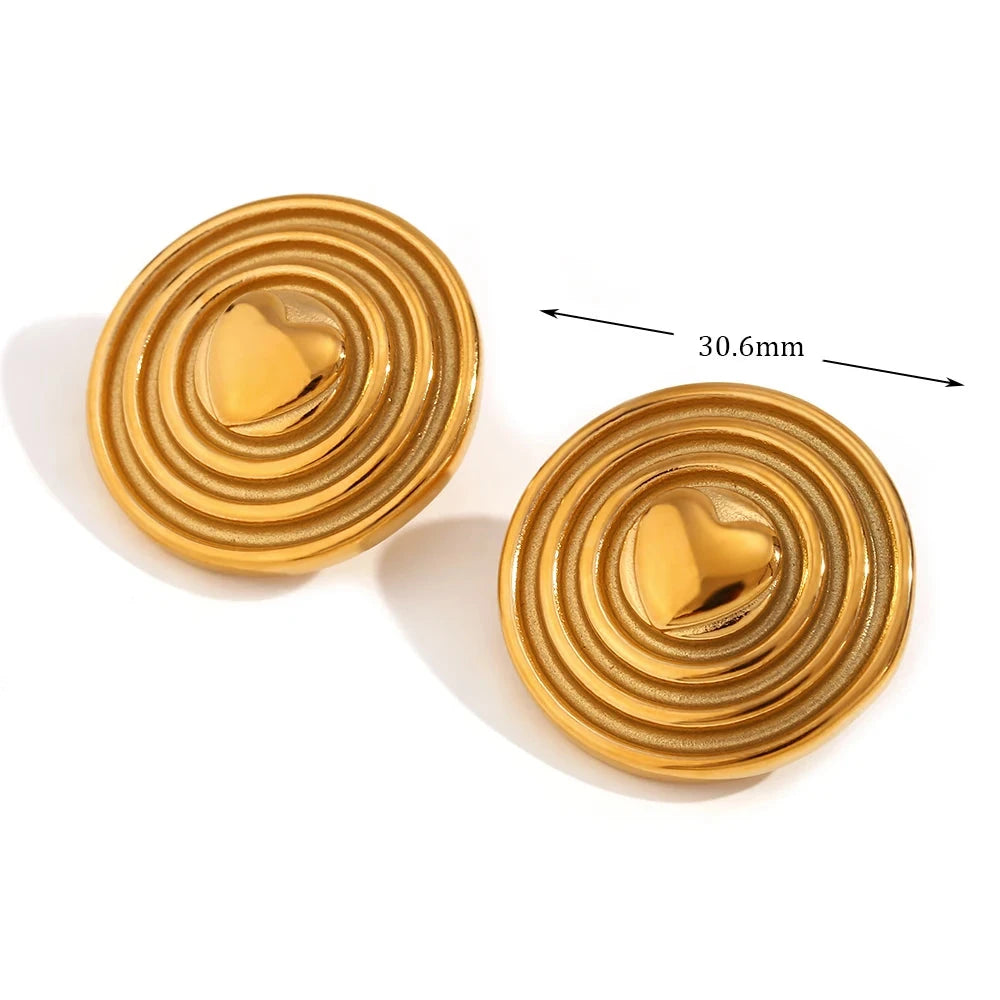 Pendientes de corazón dorado