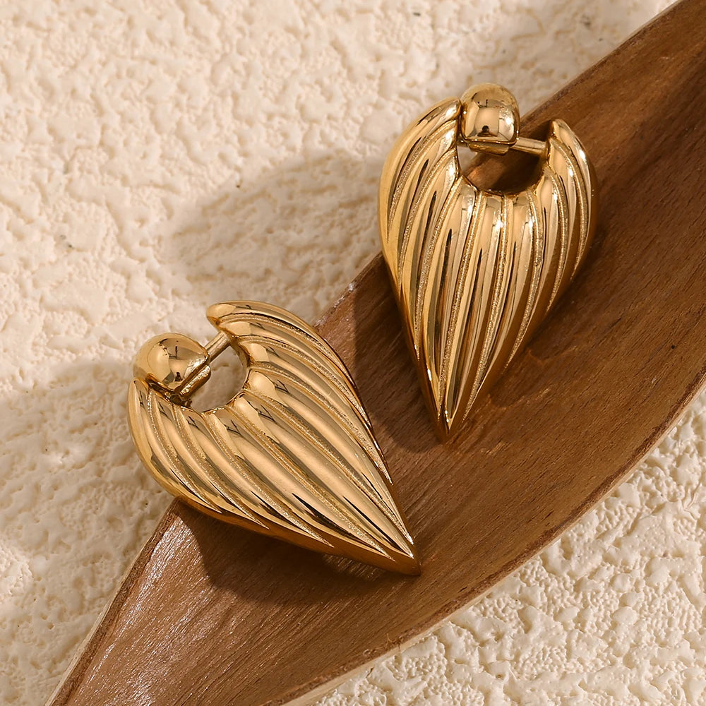 E.B.belle-pendientes de empalme de fundición de corazón y plumas, joyería de moda, decoración de acero inoxidable 316L resistente al agua