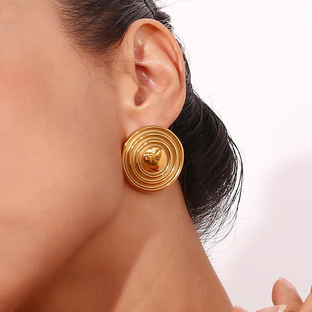 Pendientes de corazón dorado