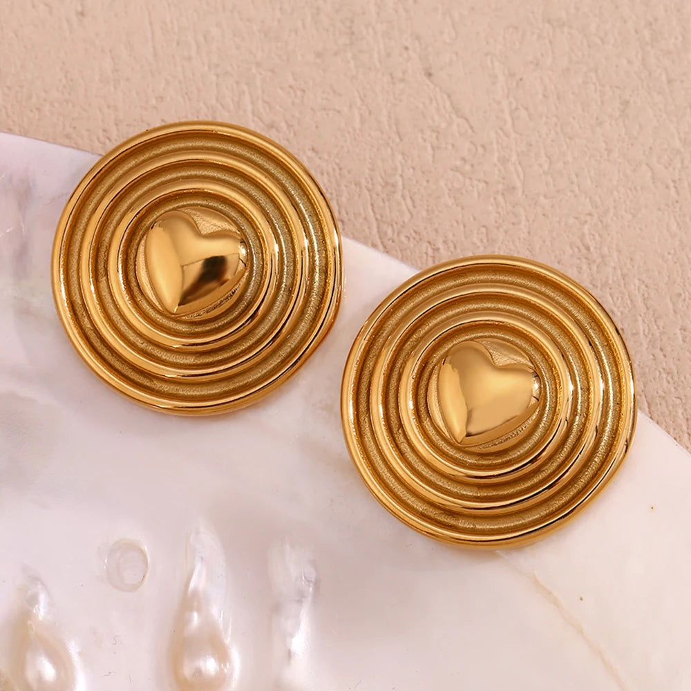 Pendientes de corazón dorado