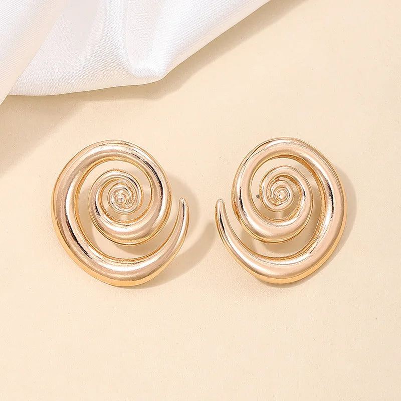 Pendientes de tuerca con textura en espiral para mujer, Color dorado Vintage, Metal brillante exagerado, pendientes con dijes huecos, regalo de joyería