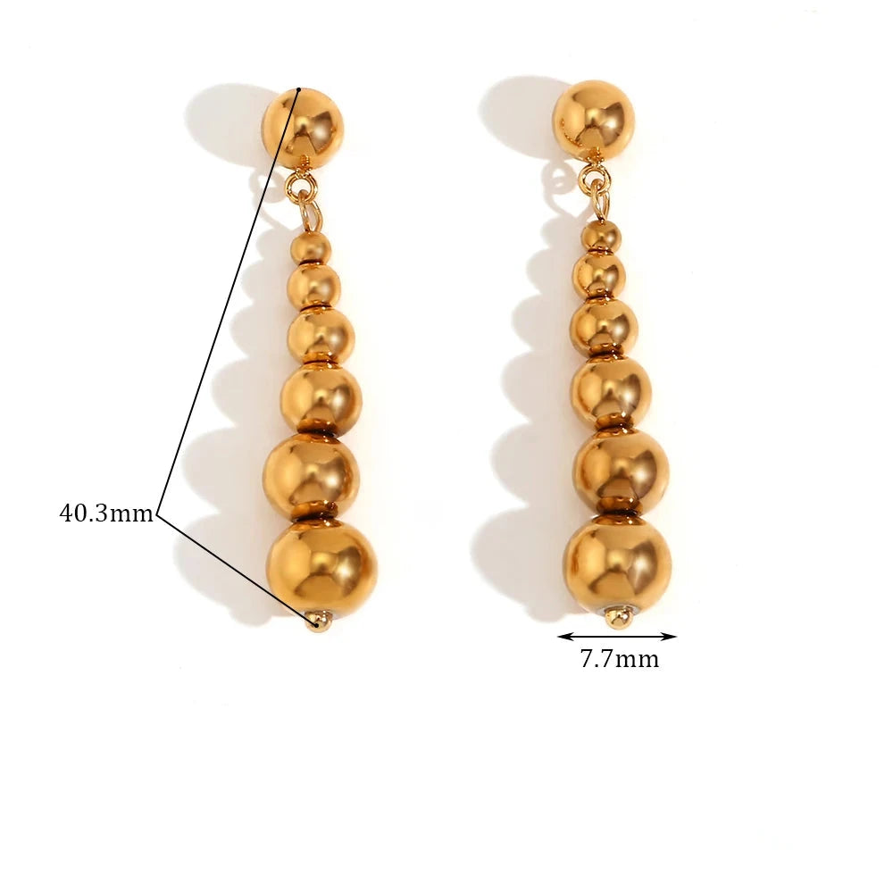 Pendientes de esfera larga