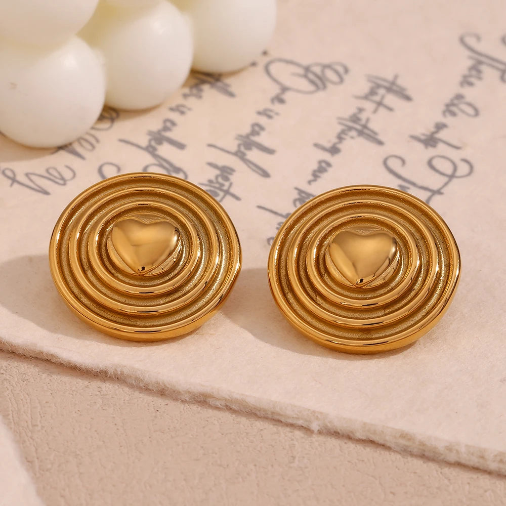 Pendientes de corazón dorado