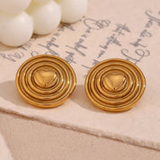 Pendientes de corazón dorado