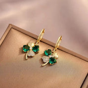 Pendientes colgantes de trébol ligeros de lujo para mujer, aretes elegantes de Metal de cristal de circón brillante, joyería fina de moda 2024