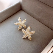 Nuevo tipo de pendientes de estrella de mar para dormir, temperamento femenino, pendientes de diseño exquisito, regalos de fiesta, joyería de moda para mujer