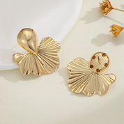 KMVEXO-pendientes de tuerca geométricos Vintage para fiesta Punk para mujer, aretes de hojas de albaricoque, accesorios de joyería para oreja a la moda, Gif 2024