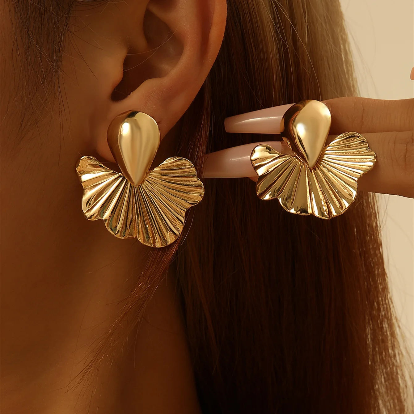 KMVEXO-pendientes de tuerca geométricos Vintage para fiesta Punk para mujer, aretes de hojas de albaricoque, accesorios de joyería para oreja a la moda, Gif 2024
